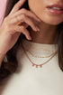 Layered necklaces with beads and hearts