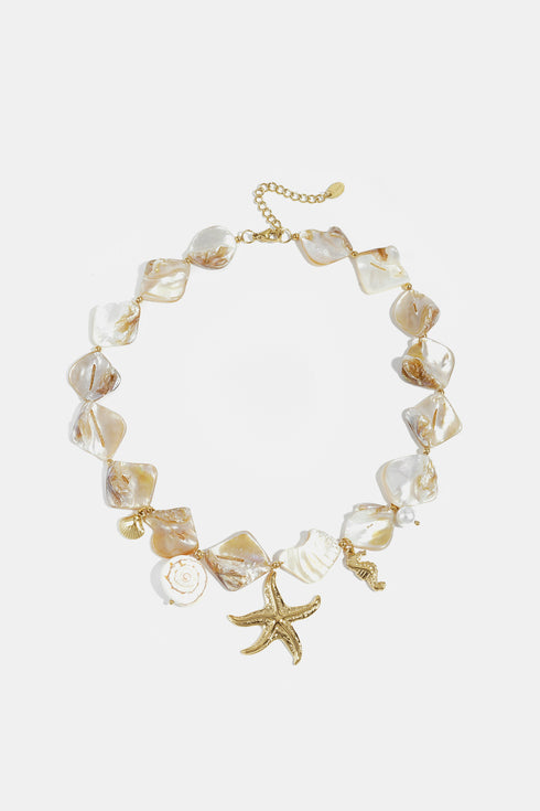 Necklace with shells, sea charms and gold beads