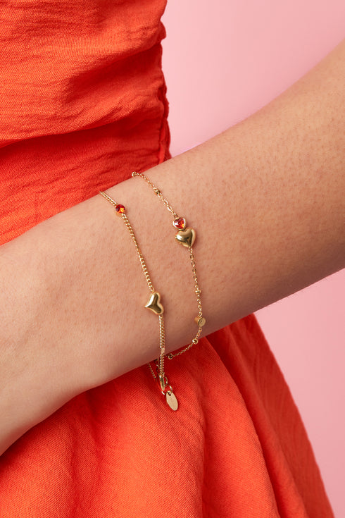 Bracelet with hearts, colored stones, and dots