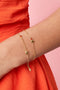 Bracelet with hearts, colored stones, and dots