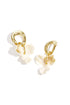 Round earrings with hanging flower