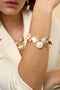 Bracelet with shells, sea charms and gold beads