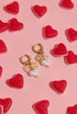 Earrings with flowers and heart pendants