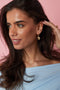Earrings with heart charm and pearl