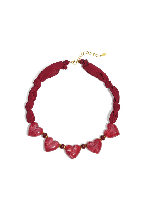 Fabric necklace with heart beads