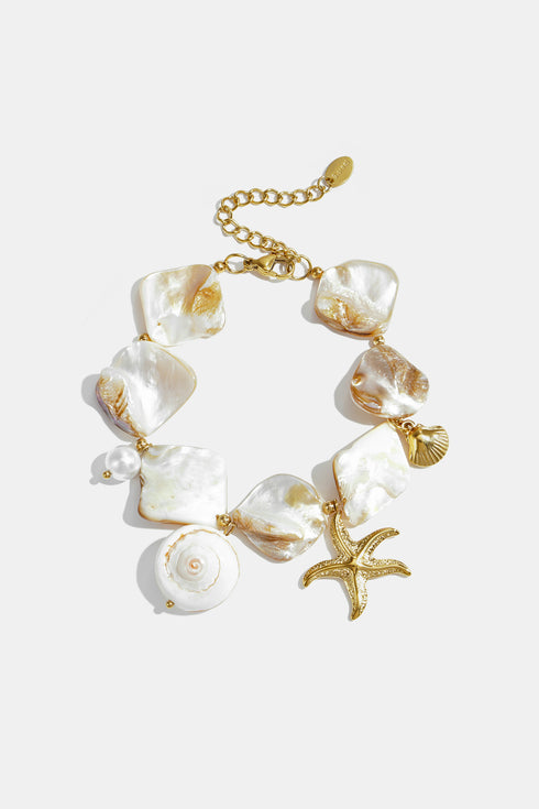 Bracelet with shells, sea charms and gold beads