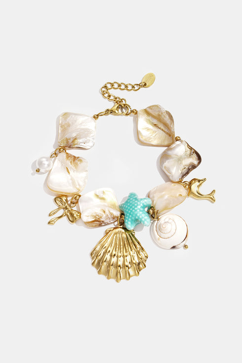 Bracelet with shells, sea charms, gold and blue beads